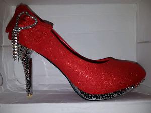Red size us 9.5, eu size 41 heels