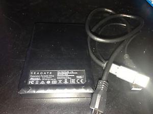 - 1 Seagate External 1TB Hardrive with cable 50$