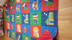 Large double bed quilt for a child. Hand quilted.