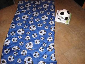 Soccer sleeping bag with soccer ball