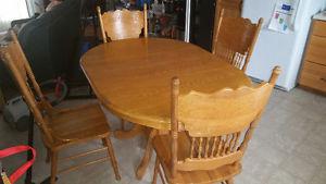 Solid oak kitchen table removable leaf complete with 4