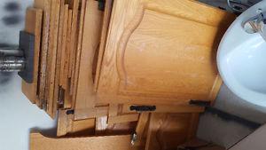 Various sets of cabinet doors and drawers