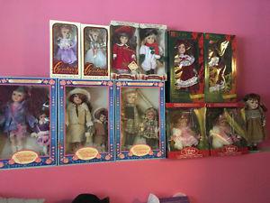 12 porcelain dolls for sale all but one still in box.