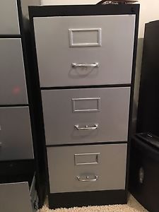 2 Solid steel file cabinets