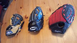 3 smaller baseball softball gloves $2 each