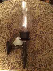 Candle lit wall sconces
