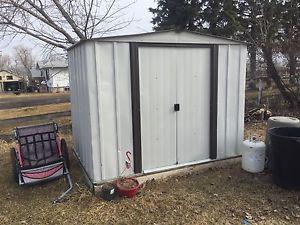 Large Metal shed on a wood skid
