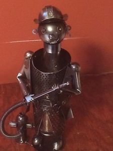 Metal fireman figurine