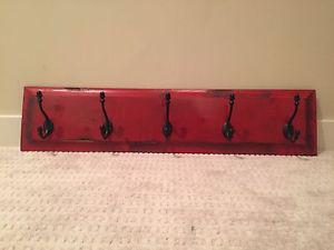 Red wooden hooks
