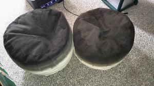 Two round poufs