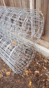 Woven wire fencing and posts