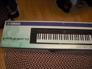 Yamaha Electric Keyboard & stand