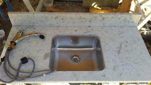 Granite counter top with sink and tap
