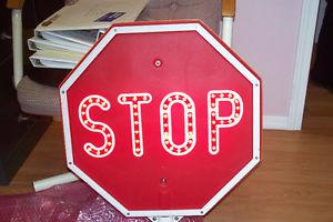 Three lighted signs