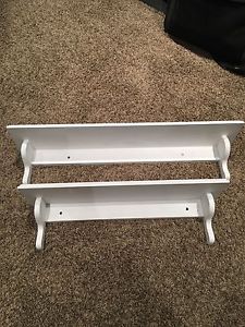 Two primed shelves