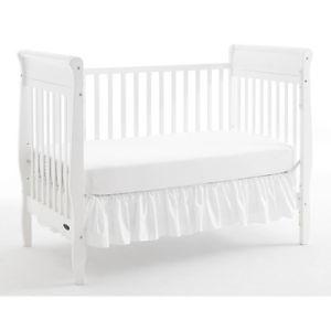 White crib and mattress