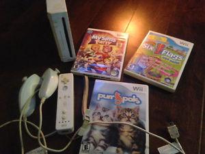 Wii with controller and nunchucks