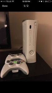 Xbox 360 with 2 controllers and 7 games