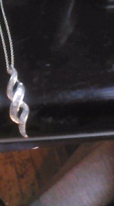 .925 sterling silver necklace with 0.20 ctw of real diamonds