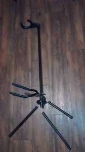 Acoustic or electric guitar stand.Broken