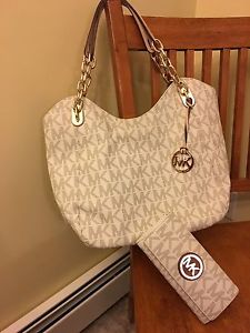 Authentic Michael Kors purse and matching wallet
