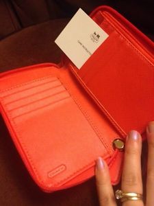 Brand new orange coach wallet/wristlet