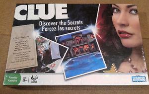 Clue (factory sealed) and Monopoly World Edition