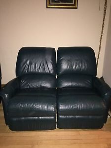 Green leather reclining loveseat