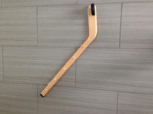 Hockey stick and puck wall hanger