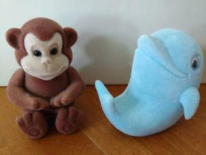 Monkey and Dolphin - cute critters with necklaces inside.