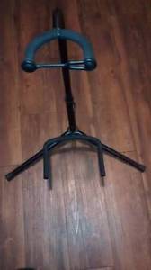 Network acoustic or electric guitar stand.Collaspable