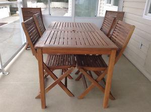 Patio table;6 wooden & 4 white resin chairs;umbrella + stand