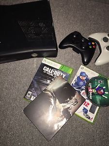 xBox 360 + Two controllers + Four games