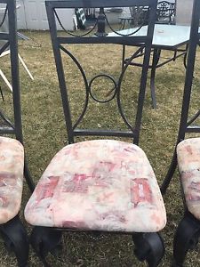 4 iron cast chairs
