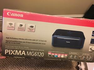 Canon wirless printer with some ink and printing cable for