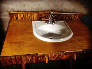 Kohler sink set into a one of a kind Diamond Willow Desk