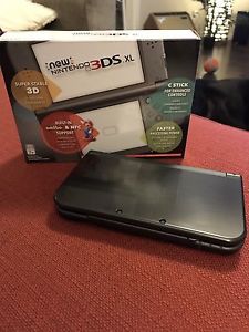 New Nintendo 3DS XL with charger and case