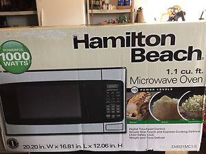 New in box Microwave