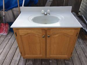 Used bathroom oak cabinet with sink