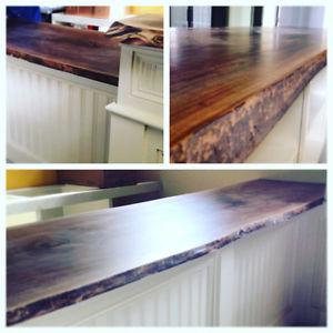 Walnut live-edge countertop and wooden cabinetry