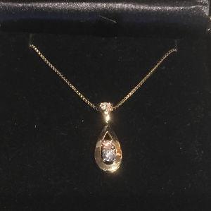 14kt yellow and white gold diamond pendant