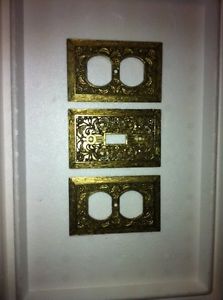 3 Gold metal wall switch covers