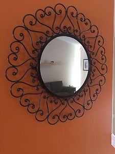 Brown metal wall mirror