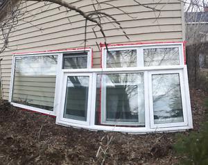Several windows for sale.