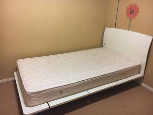 White bed frame with mattress