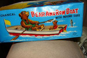 vintage s&e japanese tin toy rowing bear in his boat