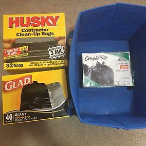 3 boxes of large black garbage bags