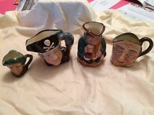A collection of Royal Doulton mugs