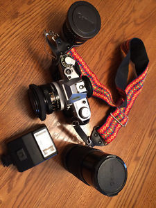 Canon AE-1 camera and lens