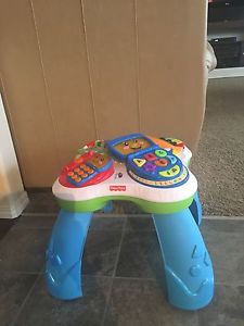 Fisher price stand up activity centre.